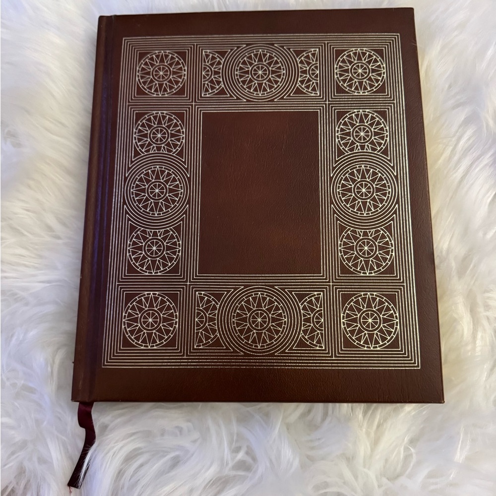 National Geographic Brown Coffee Table Book with gold Design